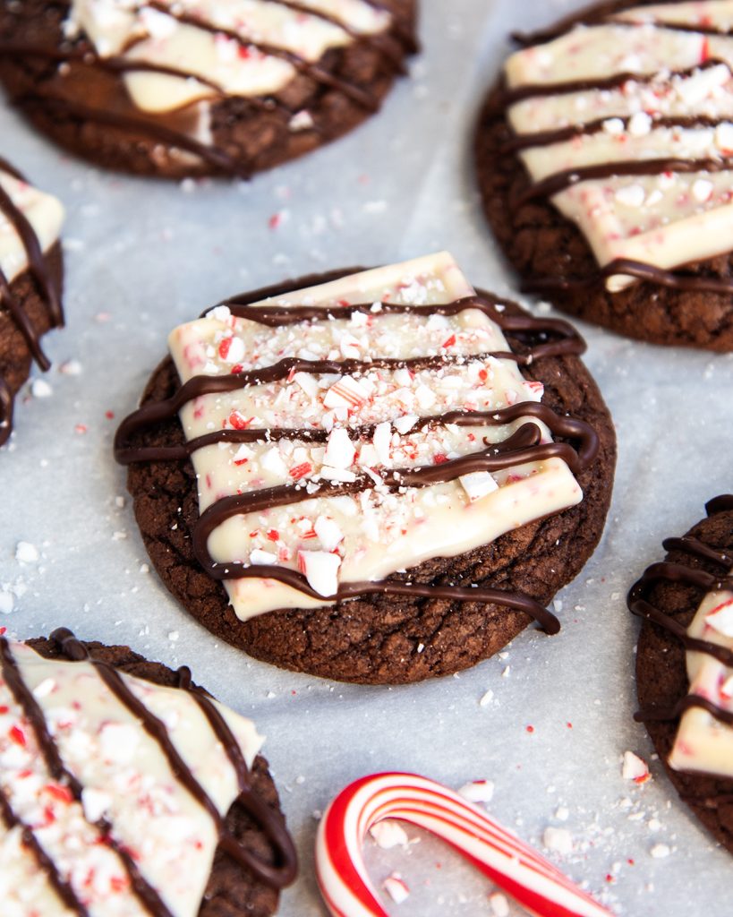 Peppermint Brownie Cookies topped with a brownie square and candy cane pieces.
