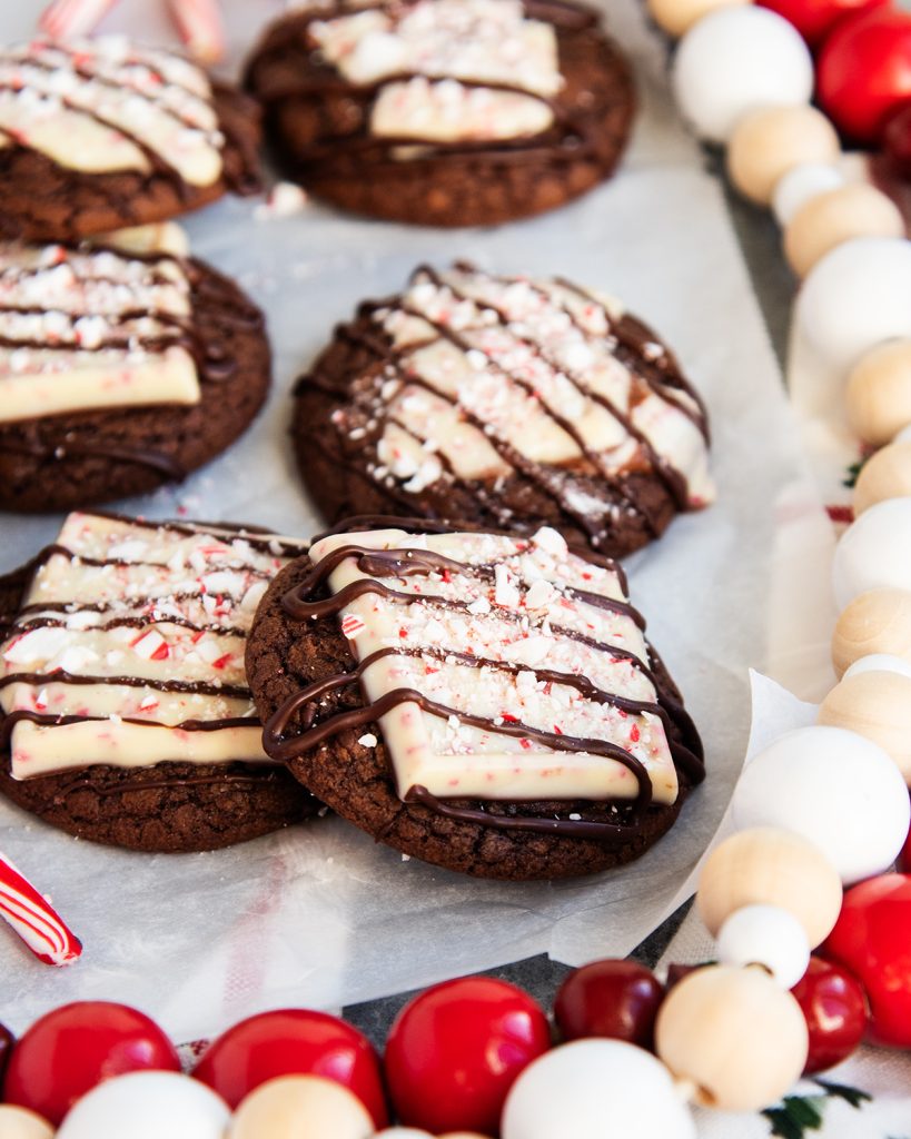 Peppermint Bark Topped Brownie Cookies, that are drizzled with melted chocolate.