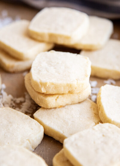 A pile of square coconut cookies.