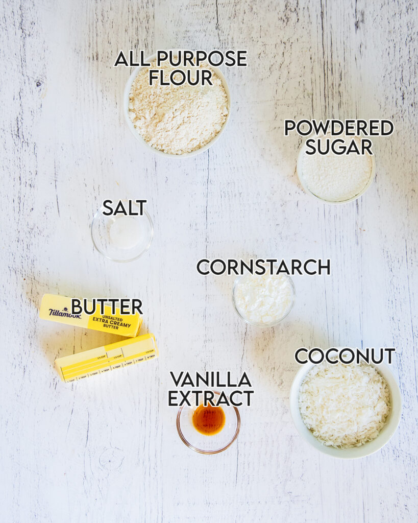 An overhead photo of the ingredients needed to make coconut shortbread cookies.