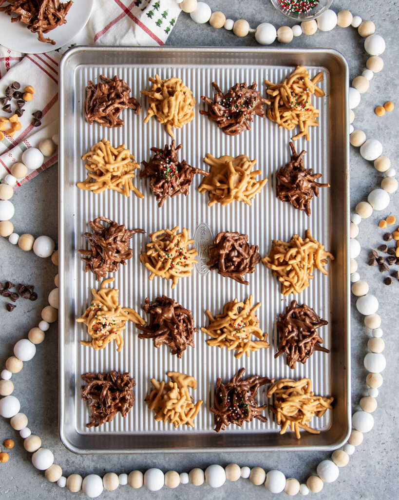 A baking pan topped with butterscotch haystacks and chocolate haystacks.