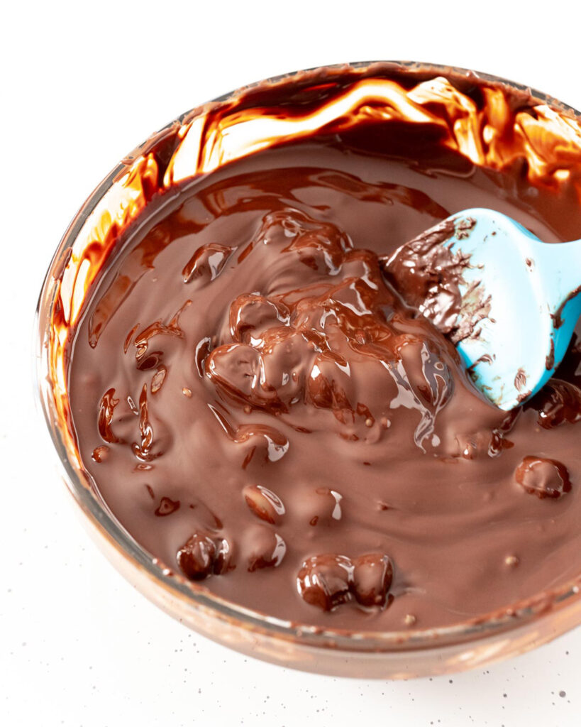 A bowl of melted chocolate.