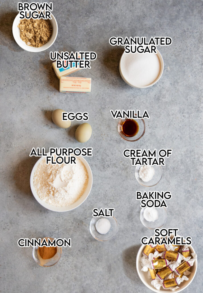 An overhead of the ingredients needed to make Caramel Brown Butter snickerdoodle cookies in small bowls.