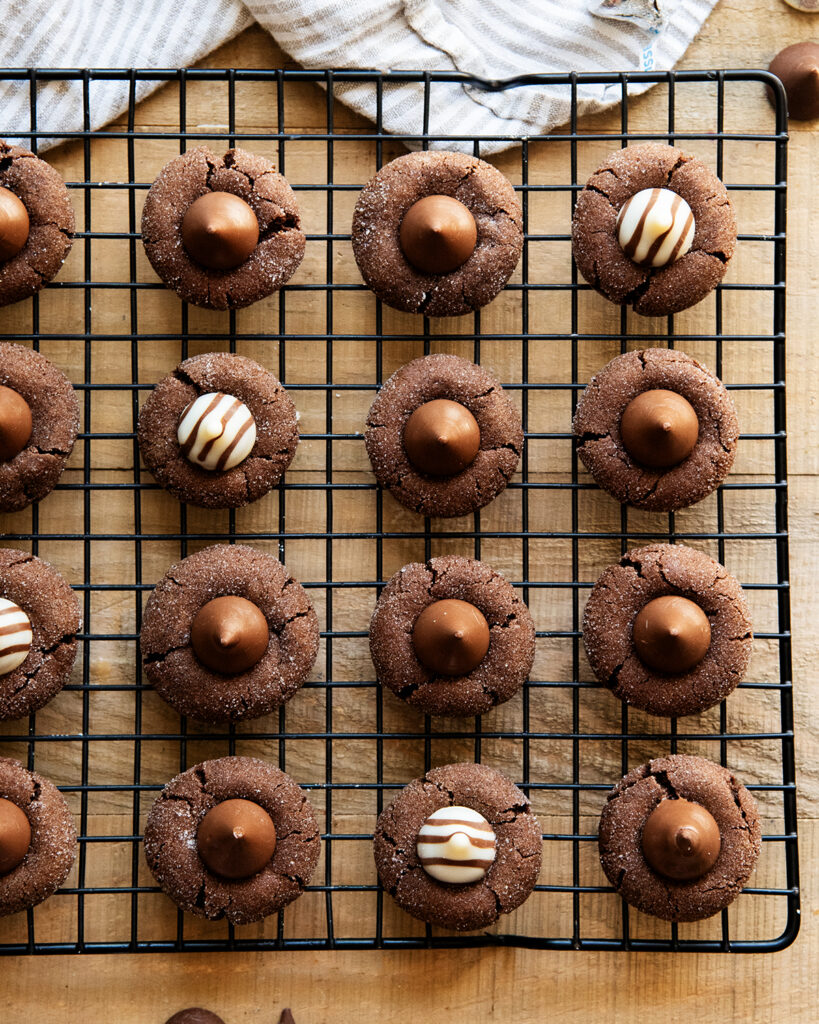 An above view of a cooling rack topped with Chocolate Blossom Cookies.