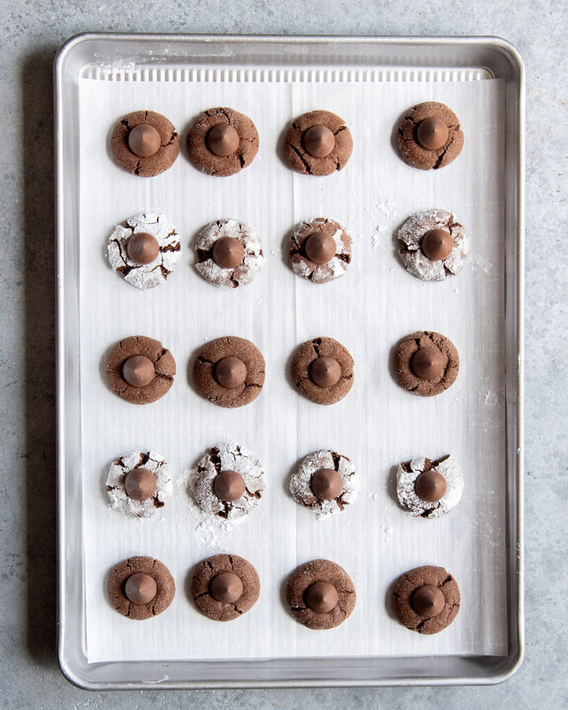 Chocolate blossom cookies on a baking pan. 