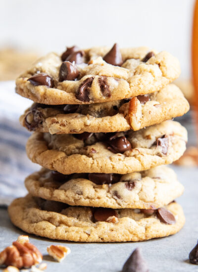 A stack of 5 maple chocolate chip cookies.