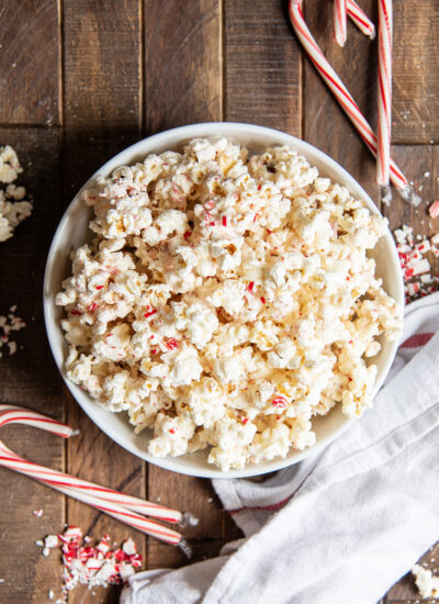 A view of a bowl from the top of white chocolate peppermint popcorn.