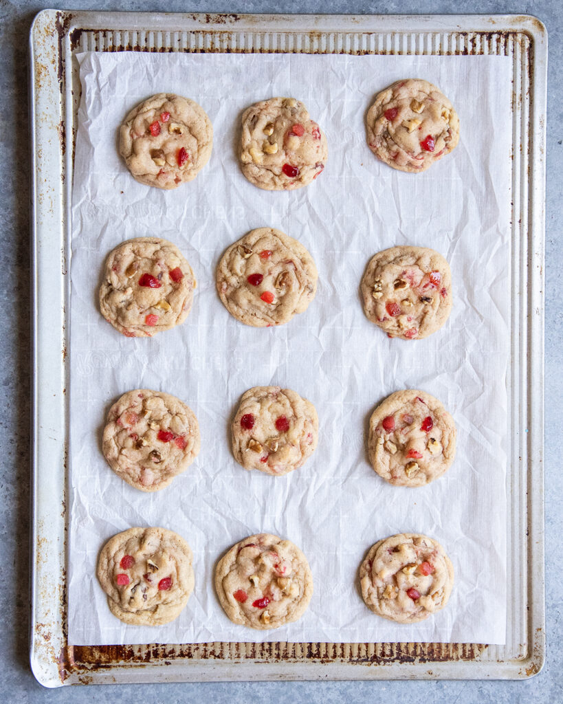 Fruitcake cookies on a cookie sheet.