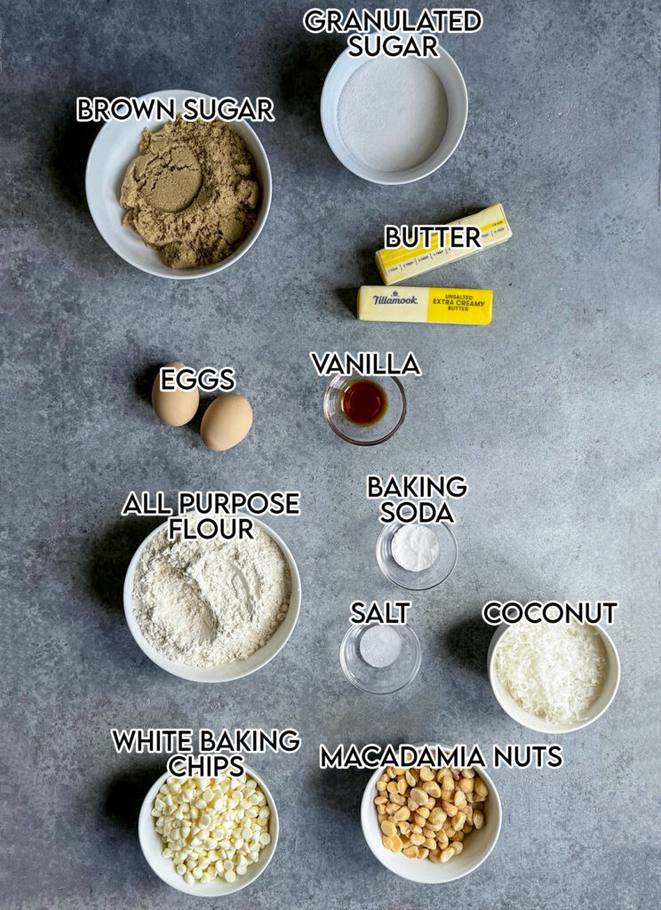 The ingredients needed to make white chocolate coconut macadamia nut cookies. 