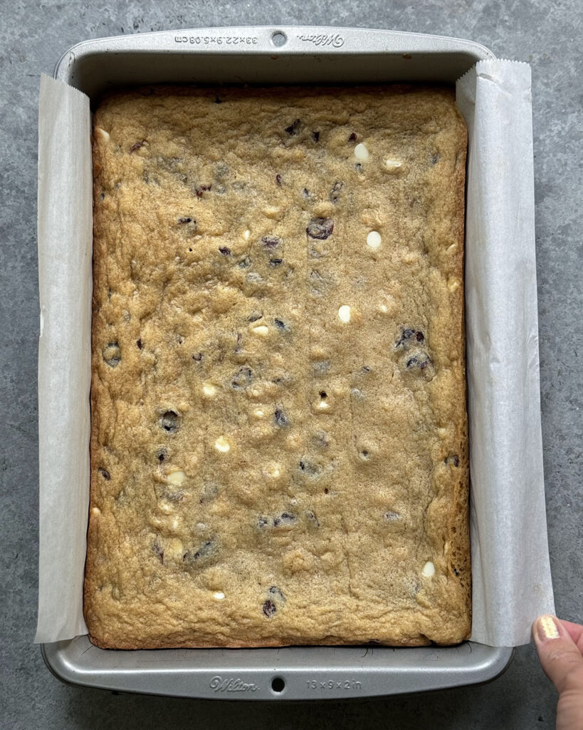 A pan of white chocolate and cranberry cookie bars.