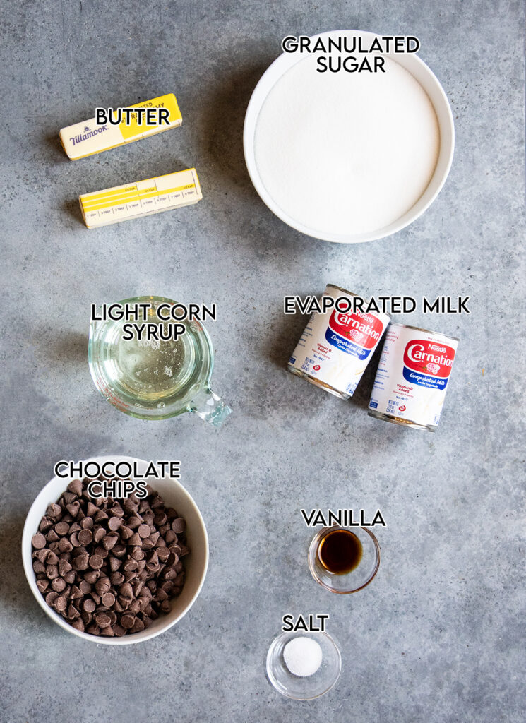 The ingredients needed to make chocolate covered caramels, in small bowls, or cans.