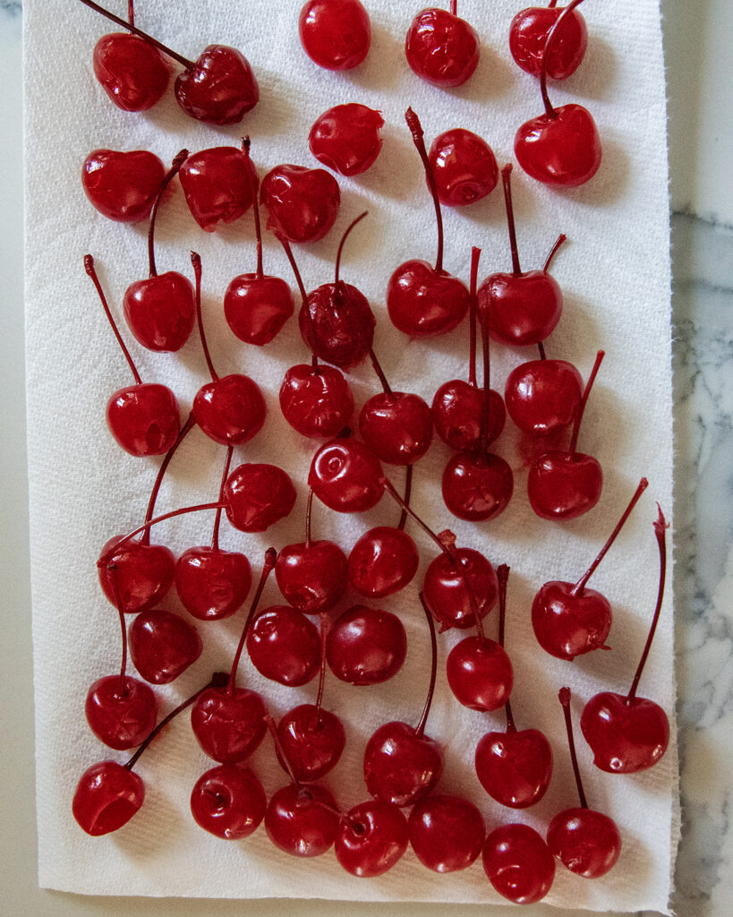 Maraschino Cherries on a paper towel.