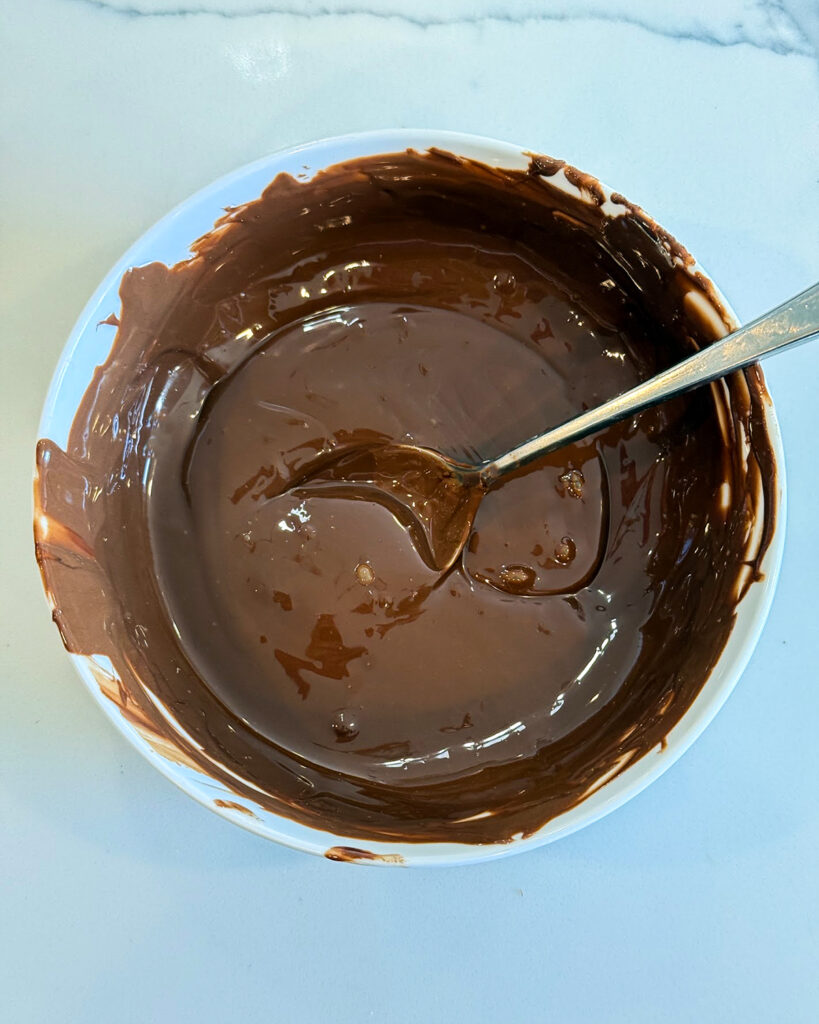 Melted chocolate in a bowl.