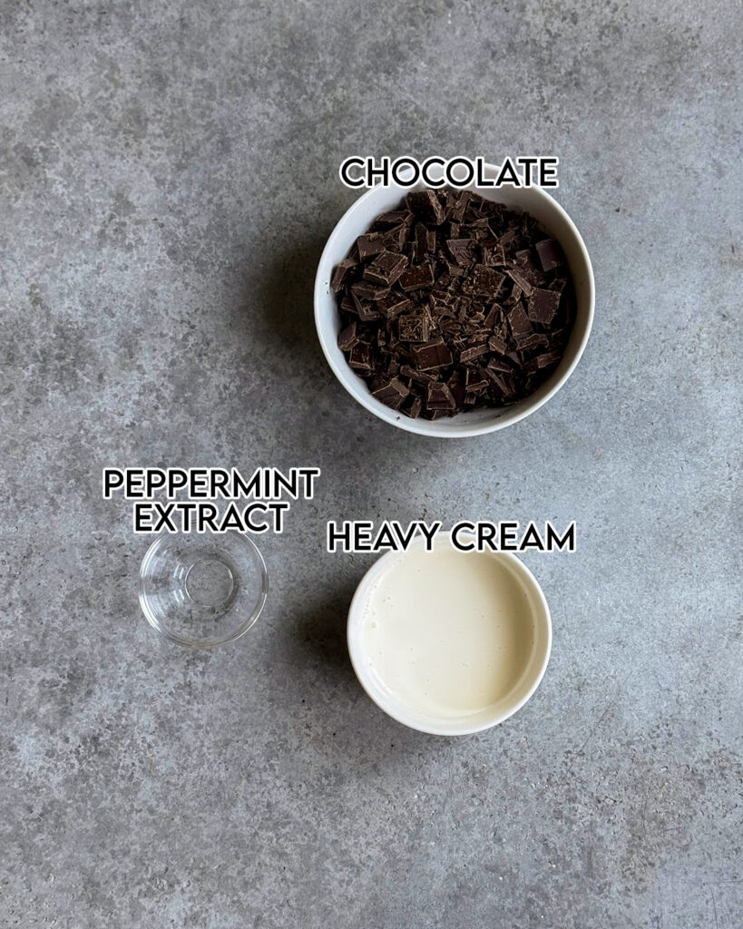 Three bowls of the ingredients needed to make mint chocolate truffles. 