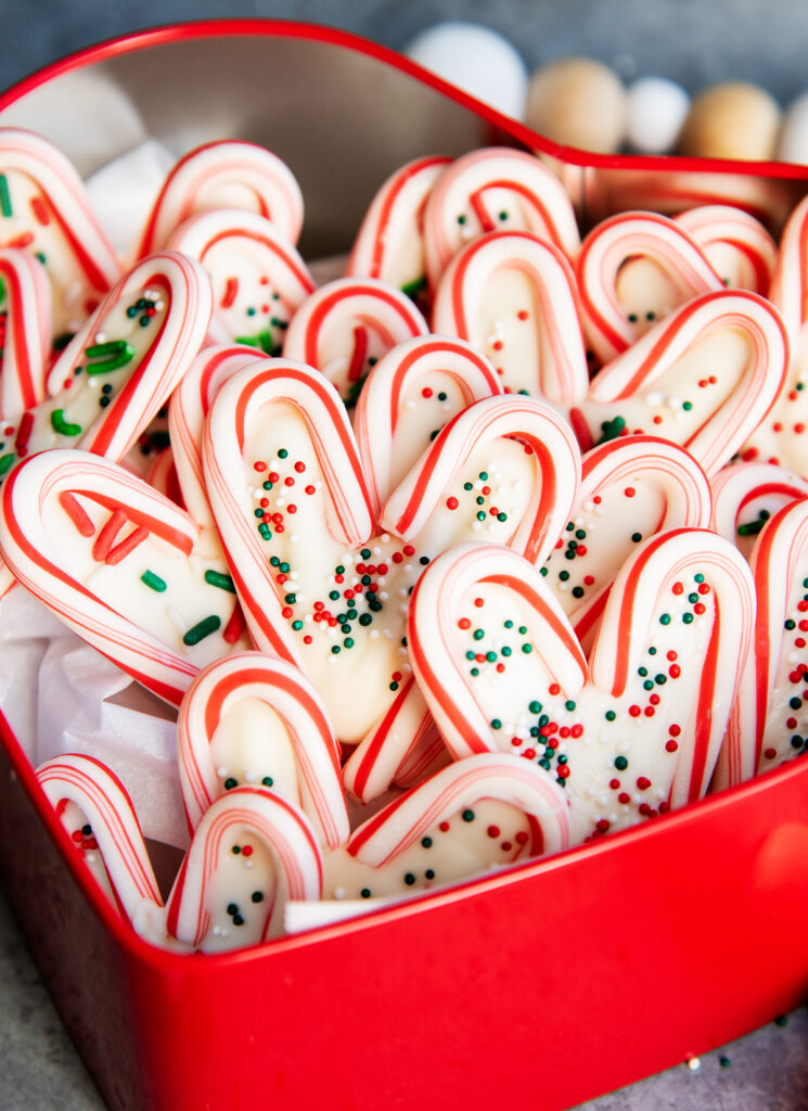 Candy cane hearts in a red tin.