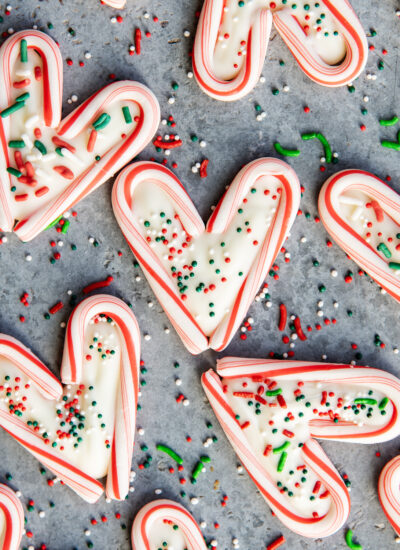 An overhead of candy cane hearts filled with white chocolate.