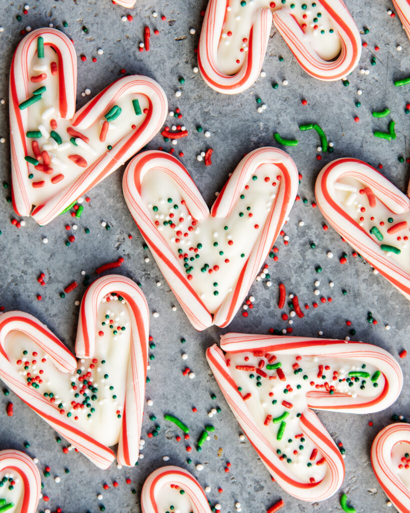 An overhead of candy cane hearts filled with white chocolate.