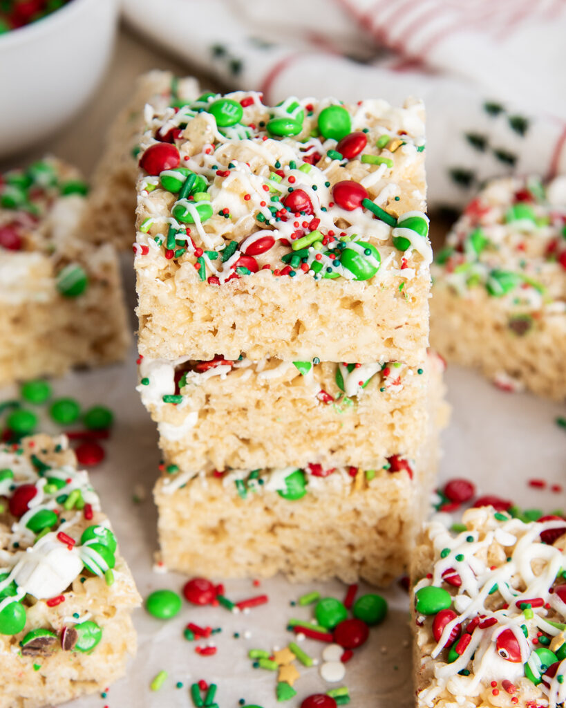 A close up of a stack of three Christmas Rice Krispie Treats.