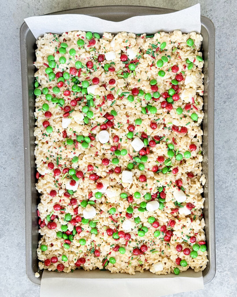 Christmas Rice Krispie Treats pressed in a tray.