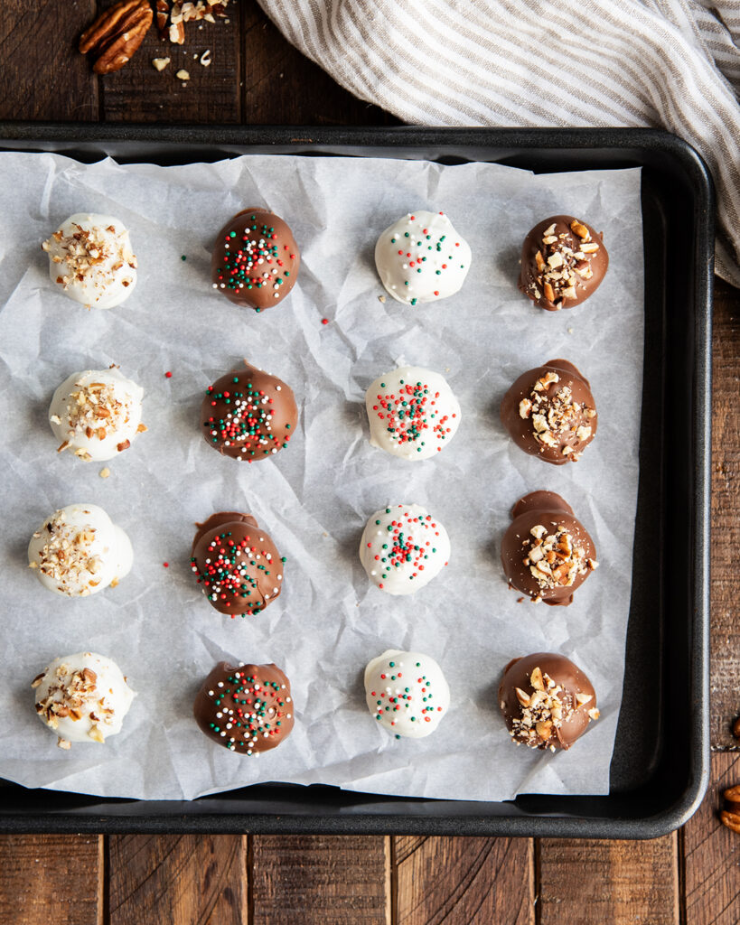 Chocolate and White Chocolate Truffles on a baking sheet.