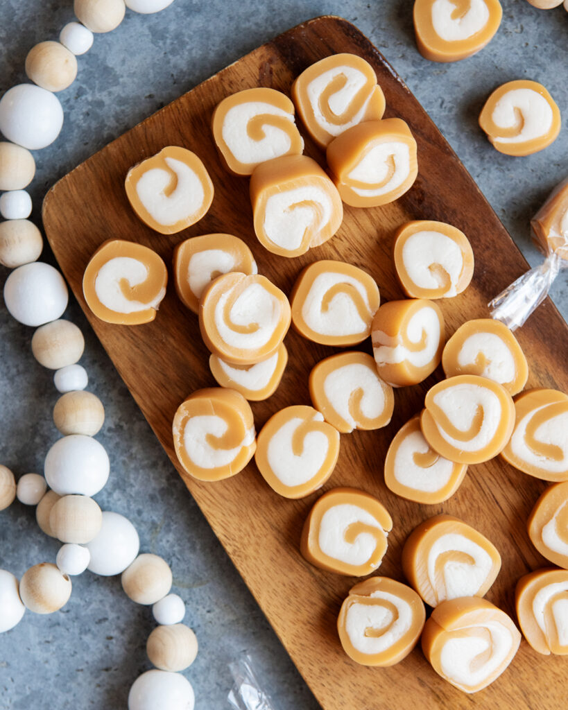 An above view of a Caramel Creams with circular caramels filled with vanilla cream in the middle.