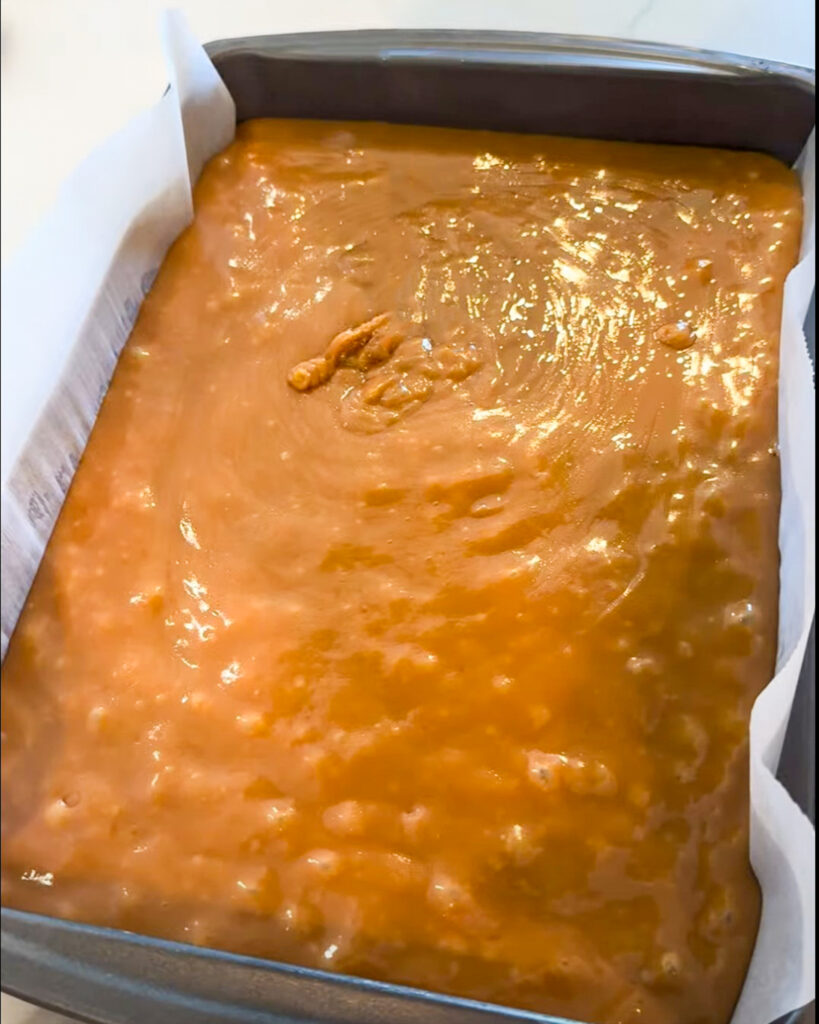 A pan filled with gooey caramel. 