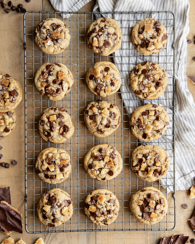 Rows of Saltine Cracker Toffee Cookies on a wire cooling rack.