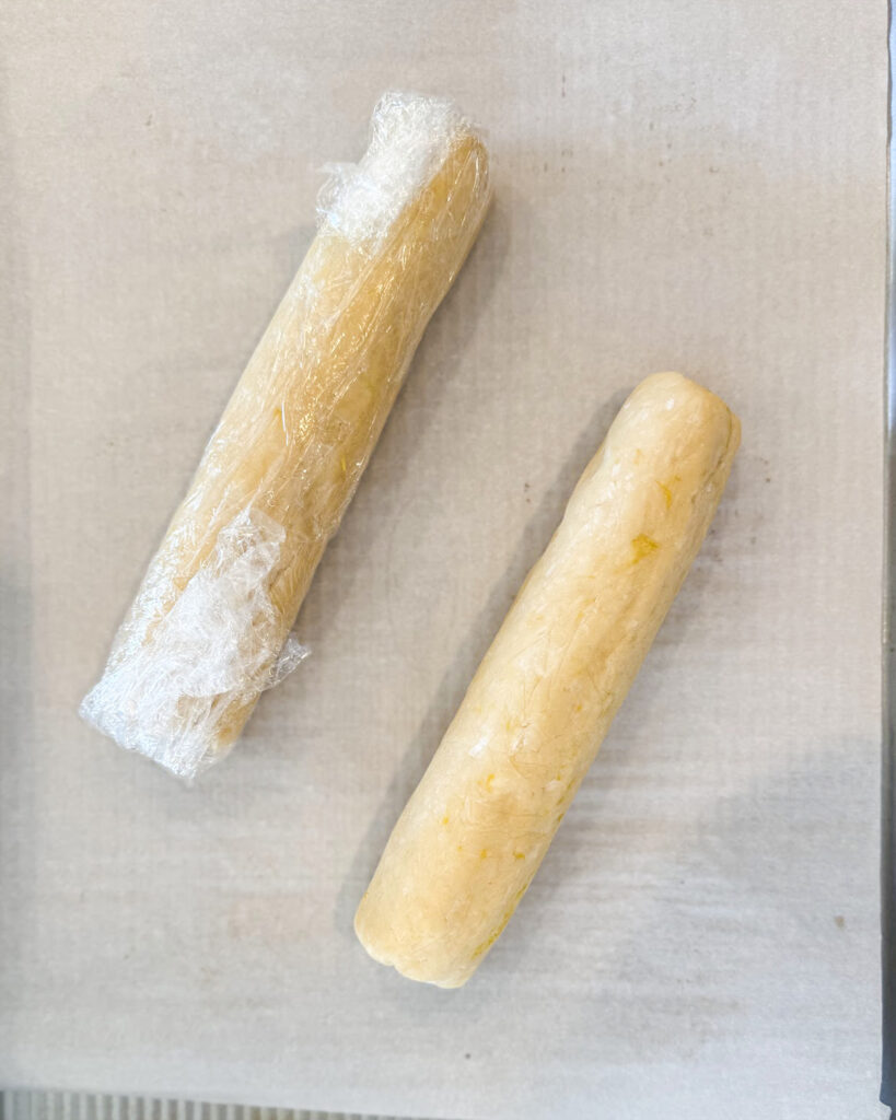 Two loaves of shortbread cookie dough.