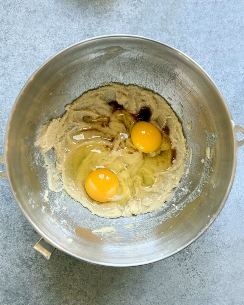 Creamed butter and sugar topped with two raw eggs and vanilla extract. 