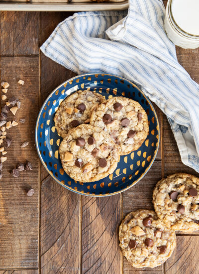 A plate of three Toffee and Oatmeal Cookies.