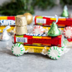A candy train made with life savers, mints, rolos, and hershey kisses.
