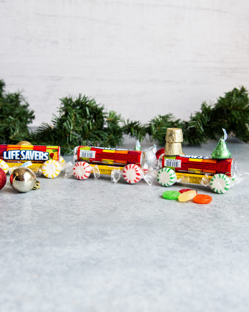 A candy train made with life savers, mints, rolos, and hershey kisses.