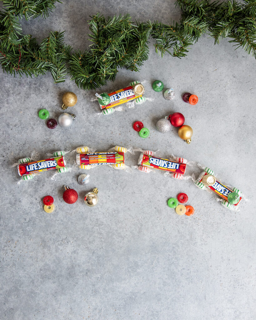 An above view of a candy train made with life savers, and other candies.