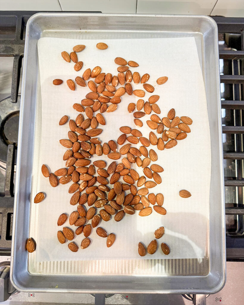 A baking pan of toasted almonds.