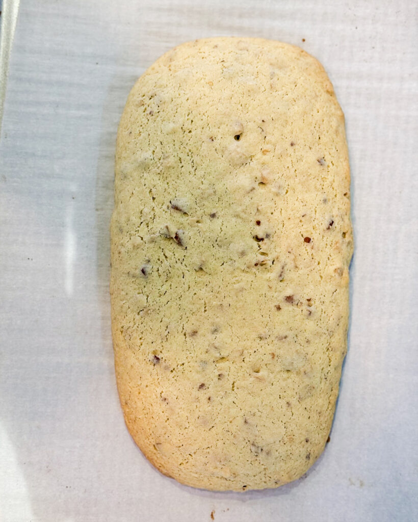 A loaf of baked almond biscotti.