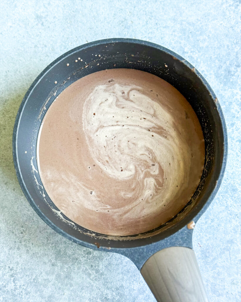 Chocolate milk mixture in a pot.
