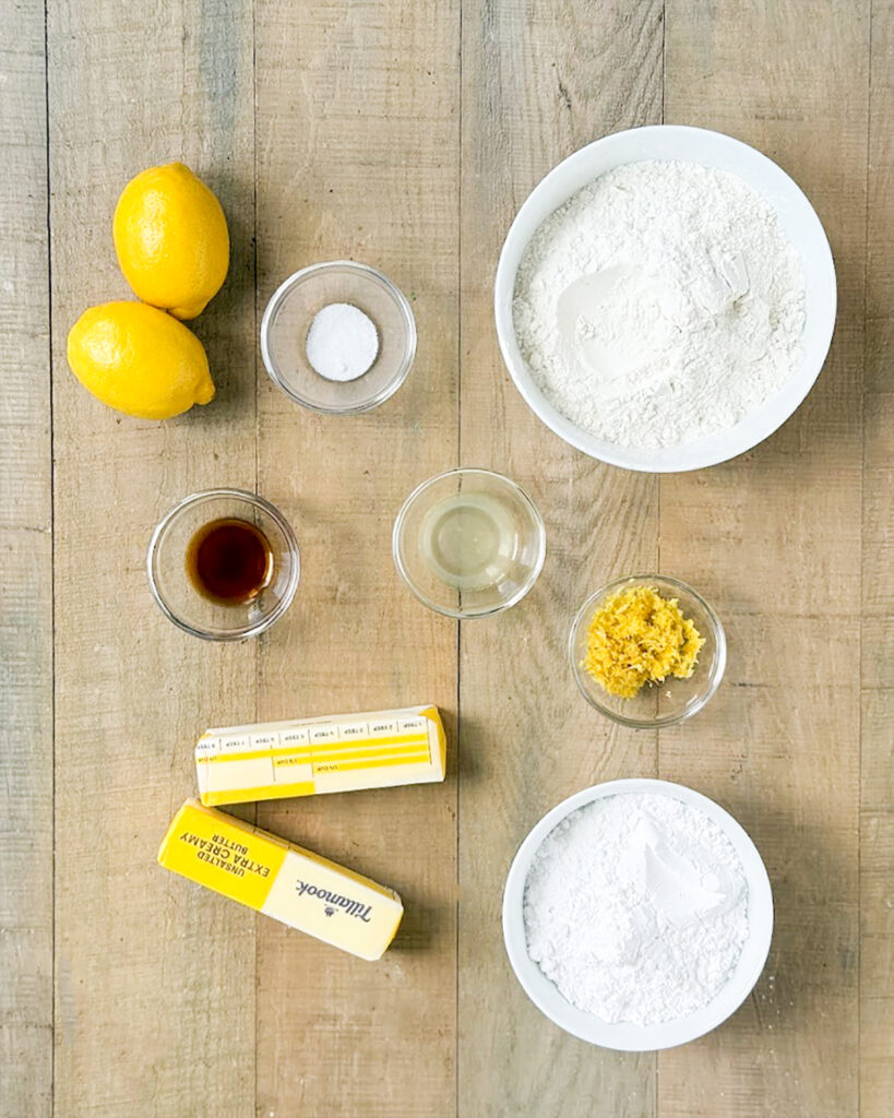 The ingredients needed to make Lemon Snowball Cookies.