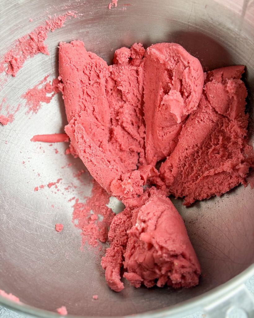 A bowl of strawberry sugar cookie dough.