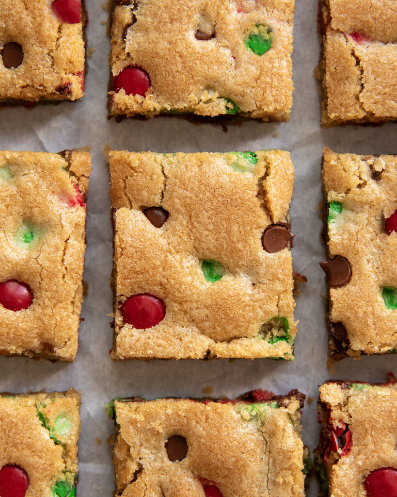 An above view of m&m cookie bars in rows.