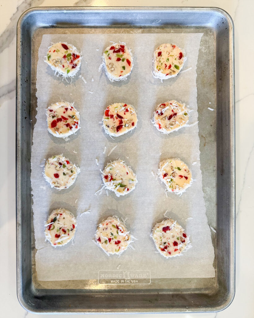 Sliced Santa's Whiskers cookies on a cookie sheet.