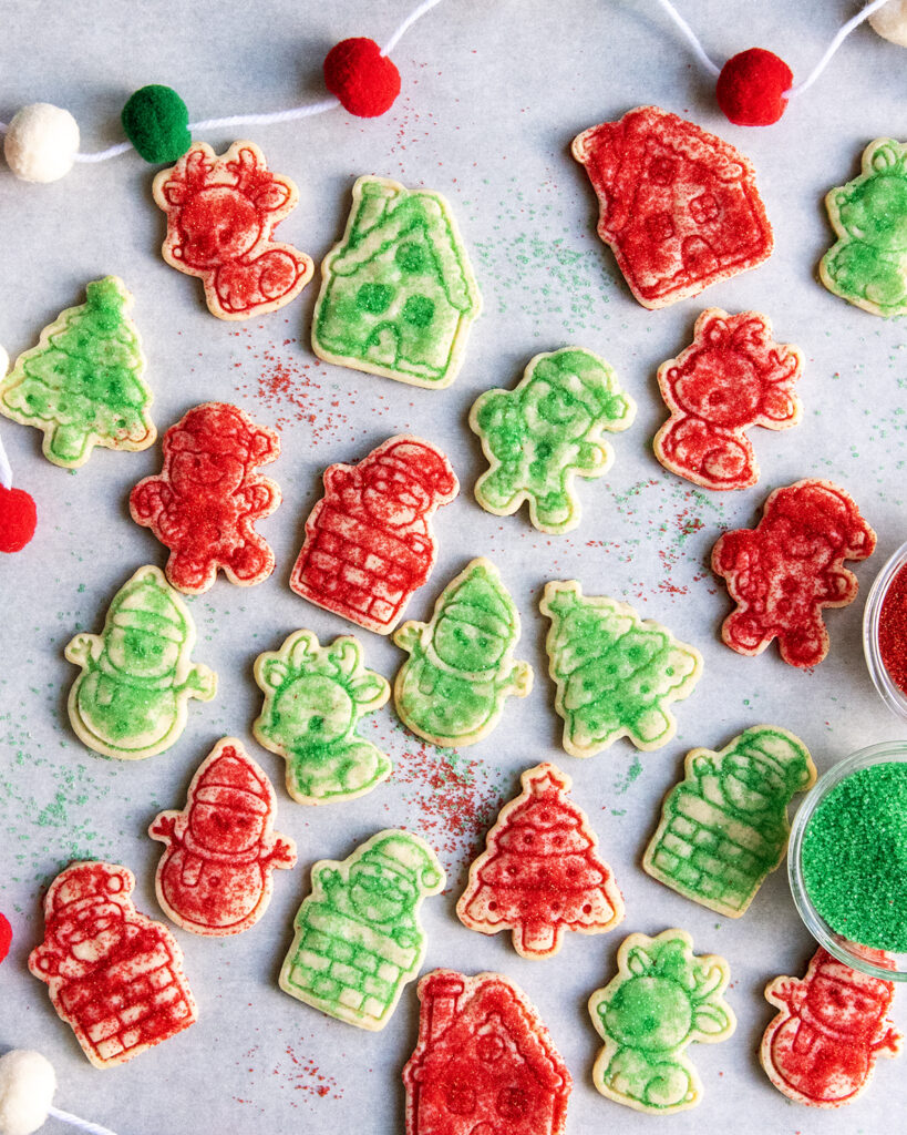An above view of christmas sugar topped shortbread cookies, decorated with red and green sugar.