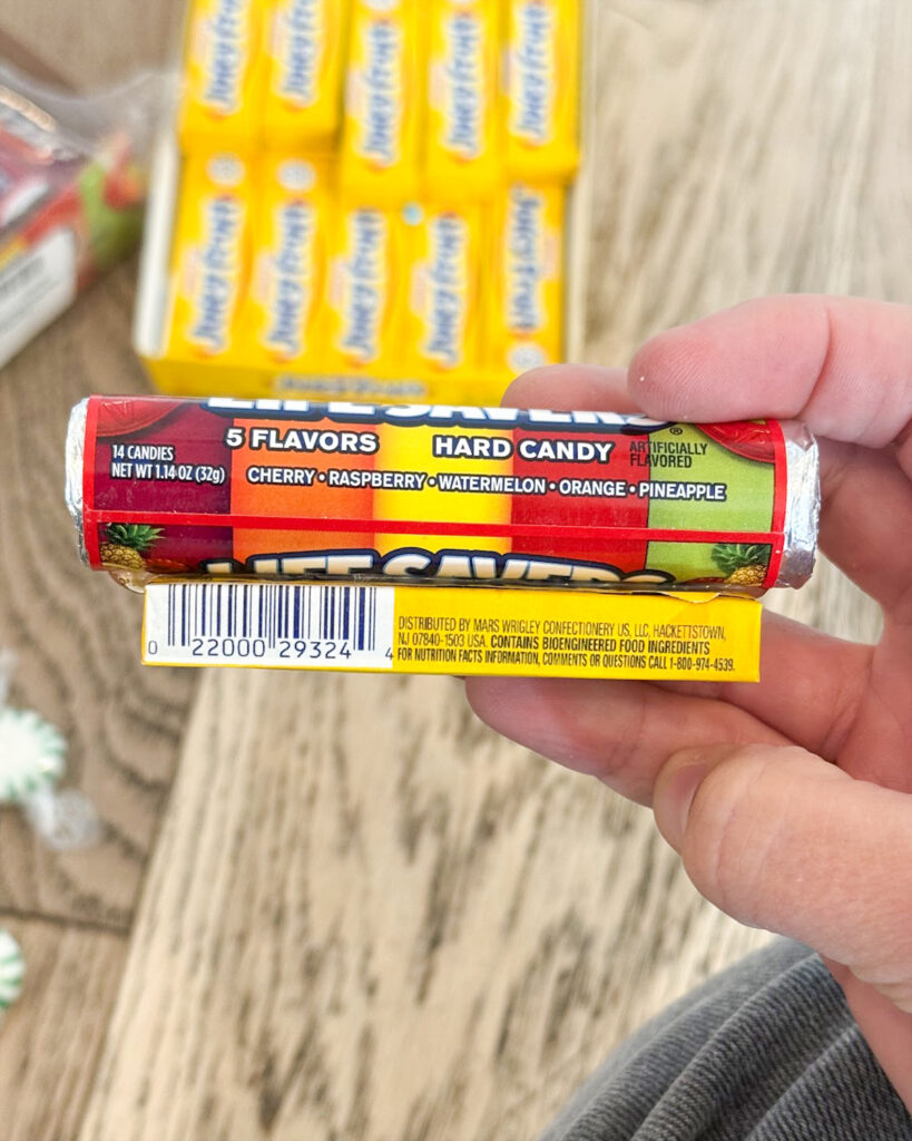 A pack of gun glued onto a roll of life savers. 