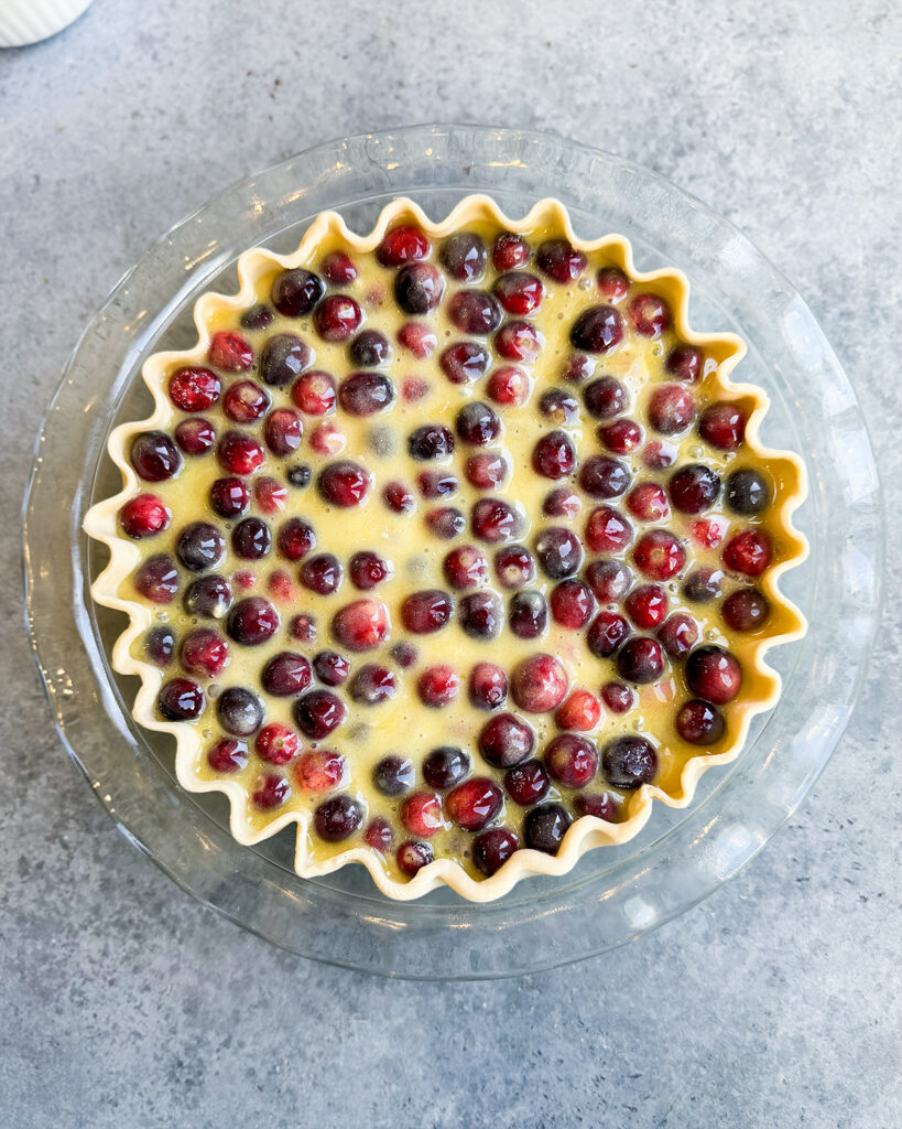 An unbaked cranberry custard in a pie crust.