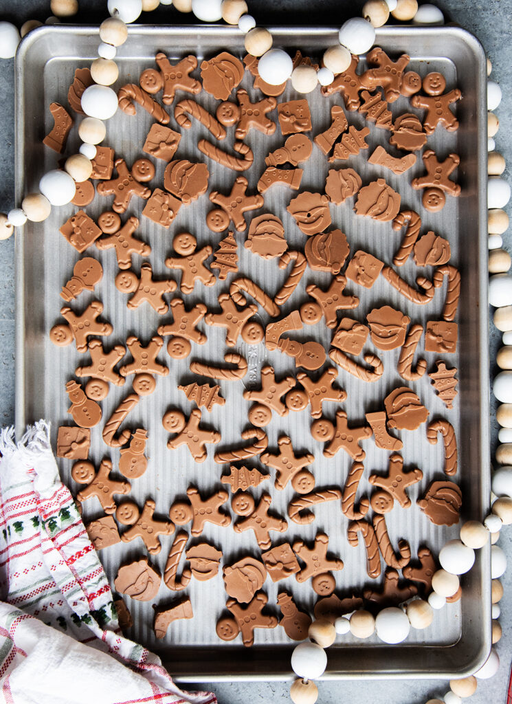 An above view of a metal tray with peanut butter meltaways.