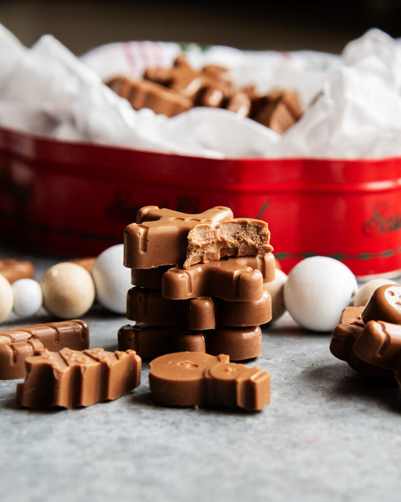 A stack of chocolate candies shaped like gingerbread men.