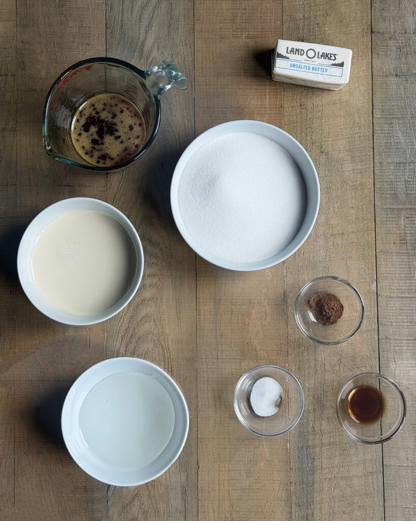 Small bowls of the ingredients needed to make Apple Cider Caramels. 