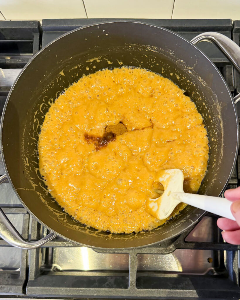 Caramels boiling in a pot.