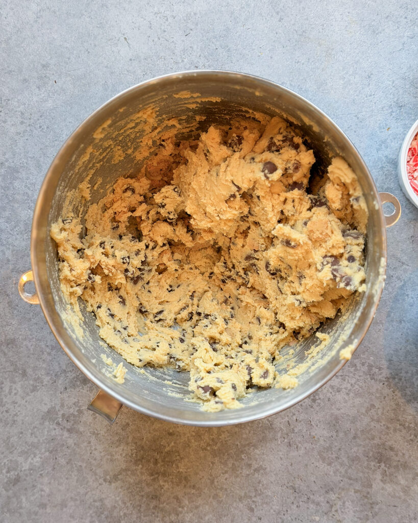 A bowl of chocolate chip cookie dough.