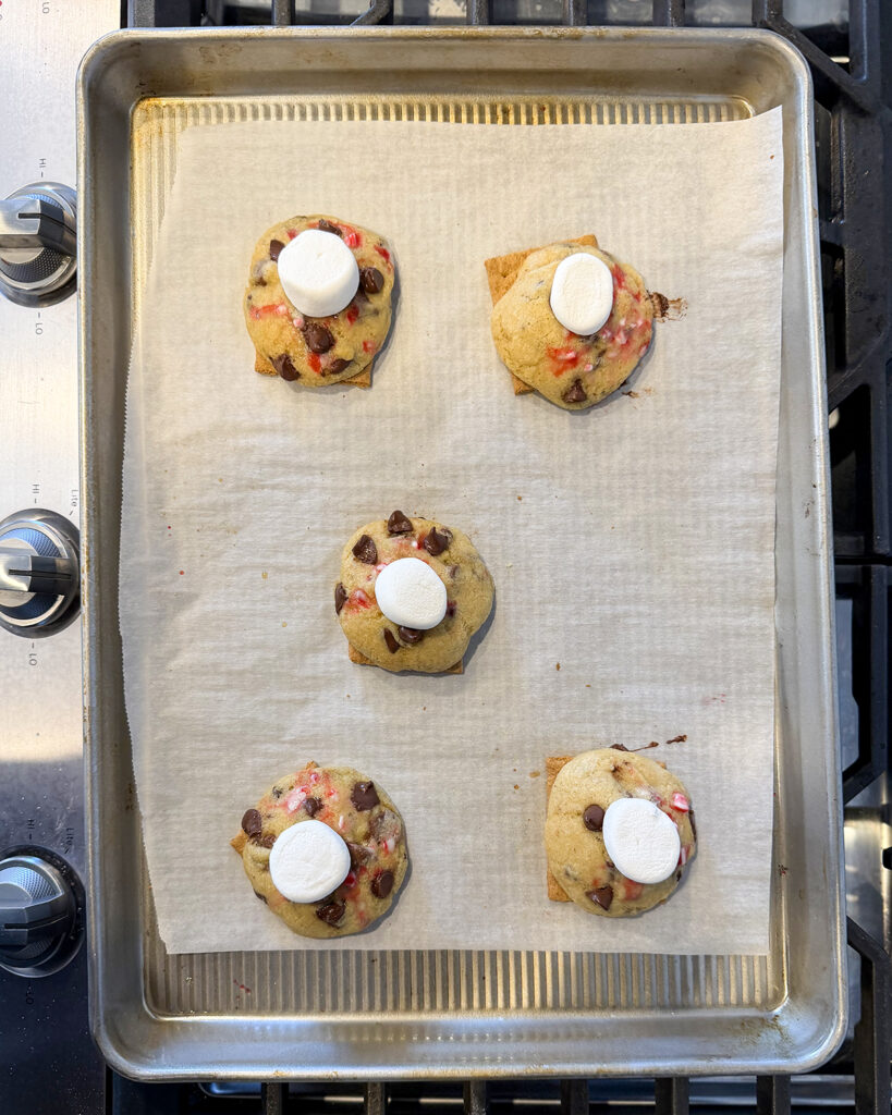 Peppermint smores cookies just baked on a cookie sheet.