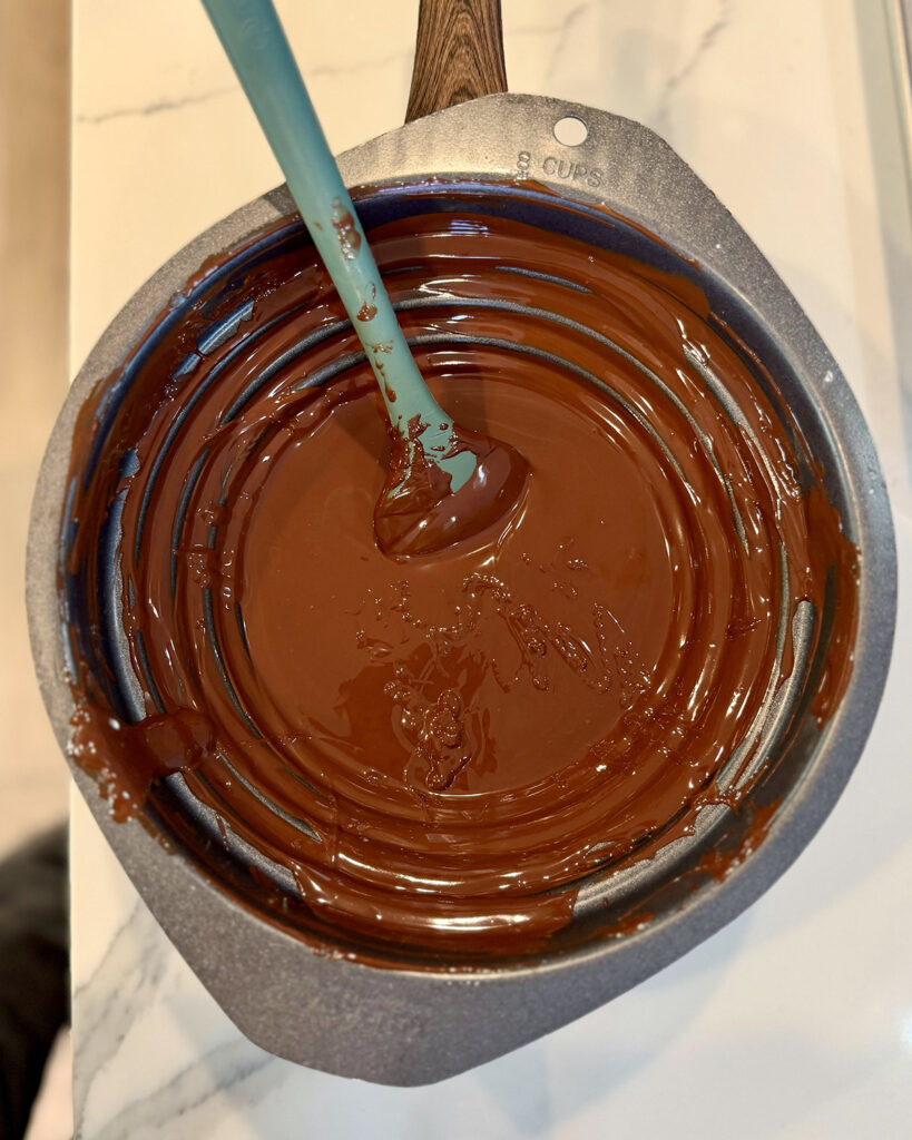 Melted chocolate in a double boiler.